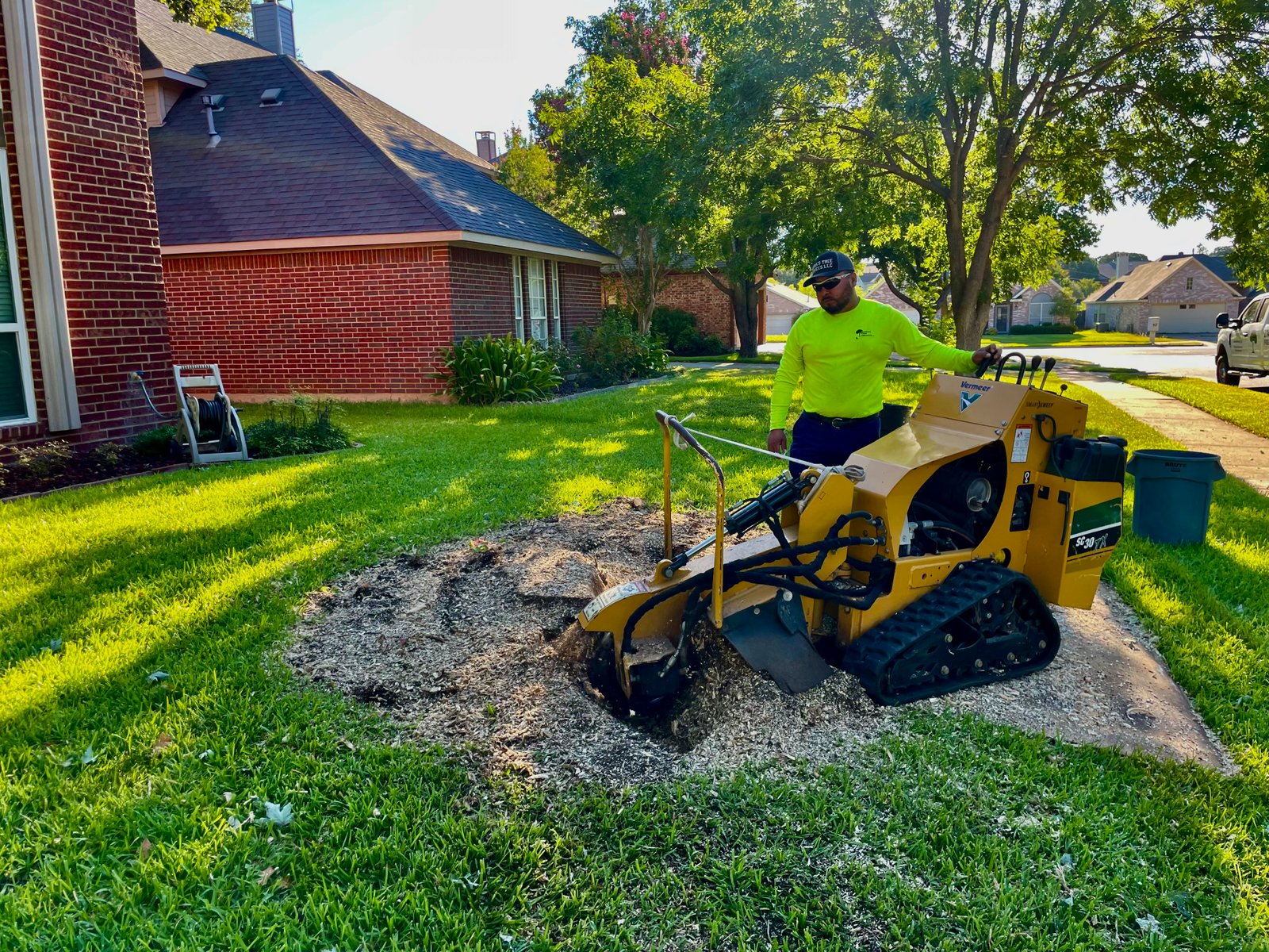 Mr.Sierra using a strump grinder to remove a stump